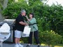 President Sarah Lamothe gives Past President Jim his service appreciation gift